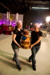 Carrying the wedding cake onto set